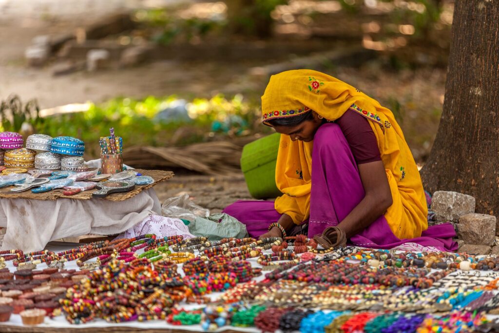 The Timeless Beauty of Indian Handicrafts: street-market-girl-india-seller